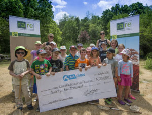 rare Summer ECO Campers help receive Maintenance Assistant Inc.'s gift with officials from both organizations. Photo provided by Maintenance Assistant Inc. 